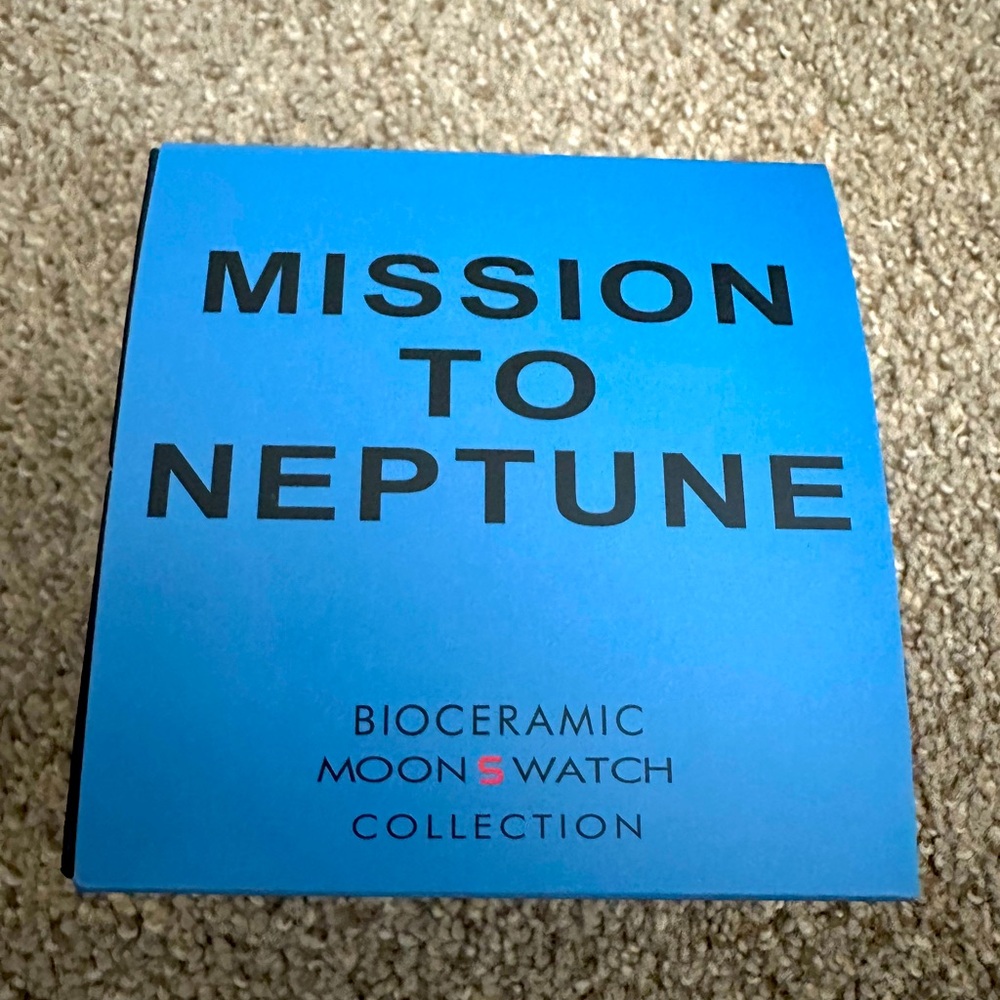 Omega moon s watch mission to Neptune